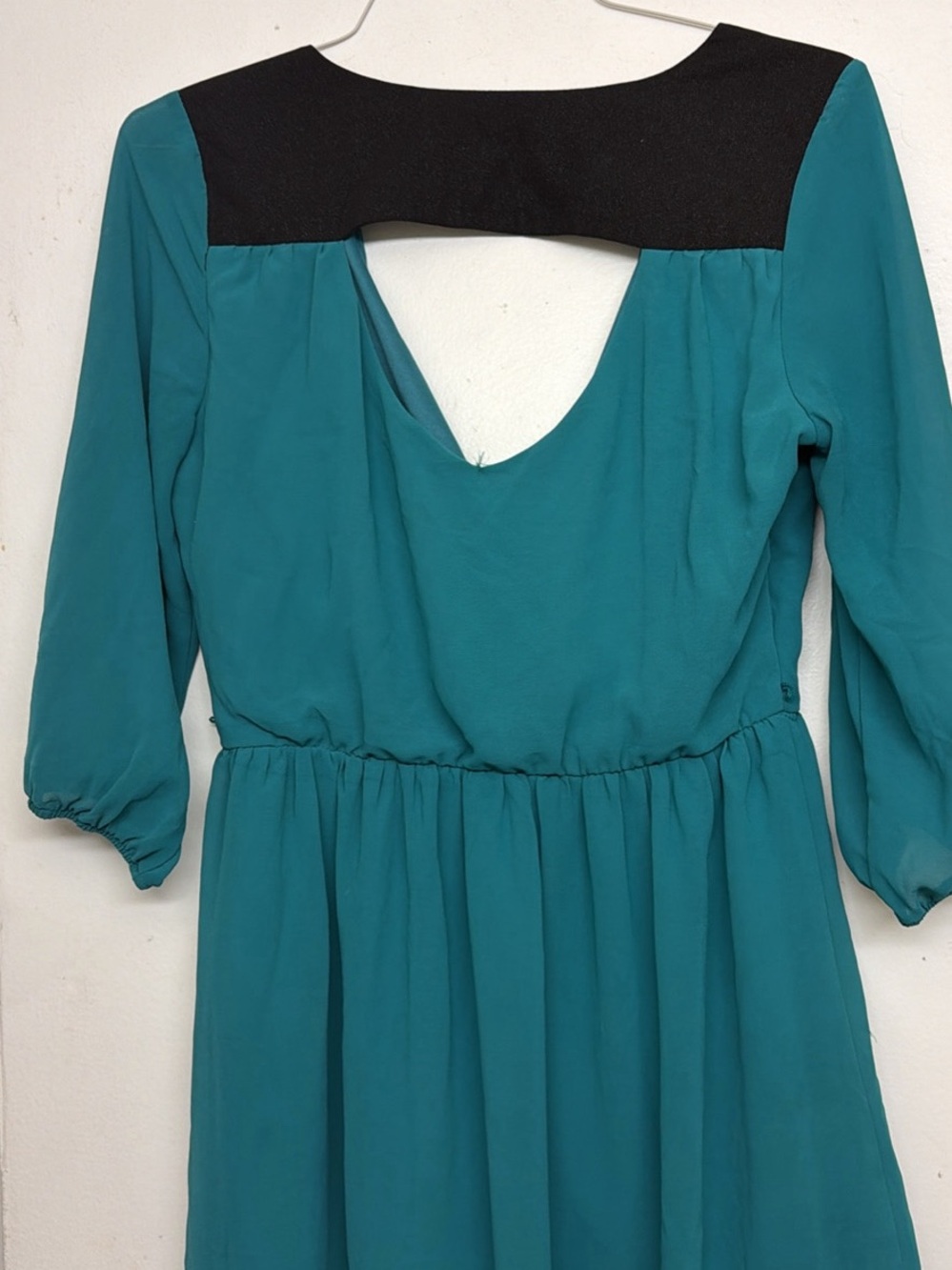 A. Byer teal dress with black detail